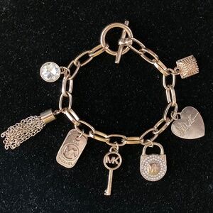 Michael Kors Gold Tone Charm Bracelet/Heart/Padlock/Key Charms